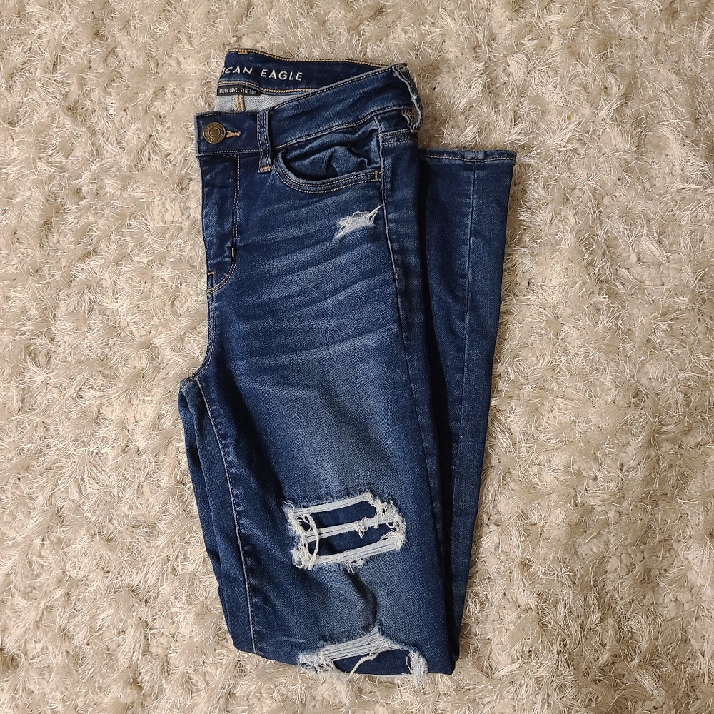 Blue distressed skinny jeans